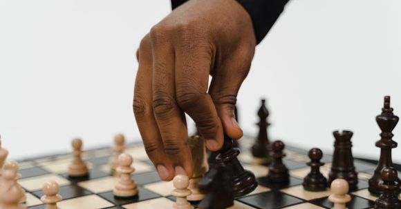 Winning Plan - Person Playing Chess